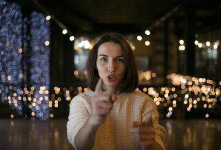 Listening Skills - a woman making a funny face with her finger