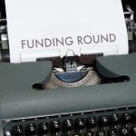 Funding Secure - green and white braille typewriter