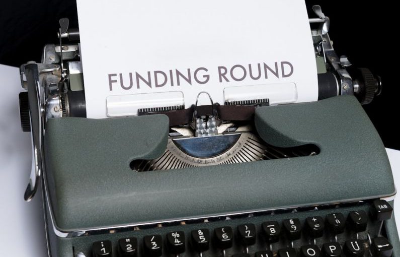 Funding Secure - green and white braille typewriter