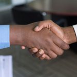 Relationships Build - two person handshaking