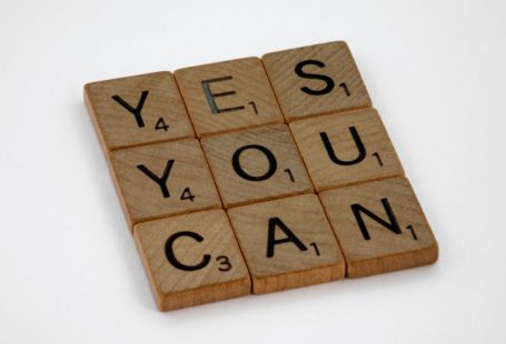 Follow-up - brown wooden blocks on white surface