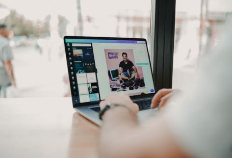 Content Creation - person using macbook pro on brown wooden table