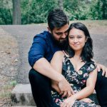 Seniors Engaged - man wearing blue dress shirt and black pants and woman in black floral dress