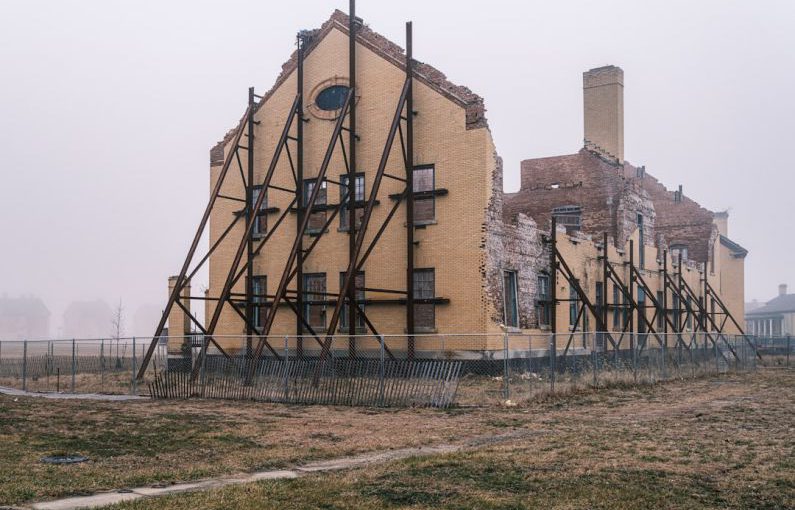 Resilience Building - a large building with a clock on the side of it