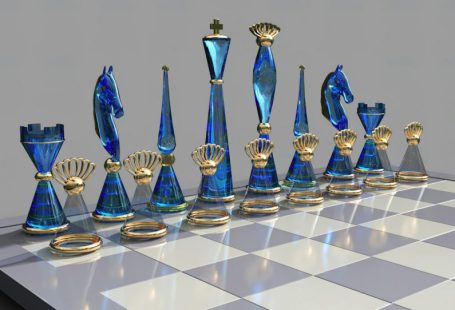 Strategy Concept - a chess board with blue glass pieces on it